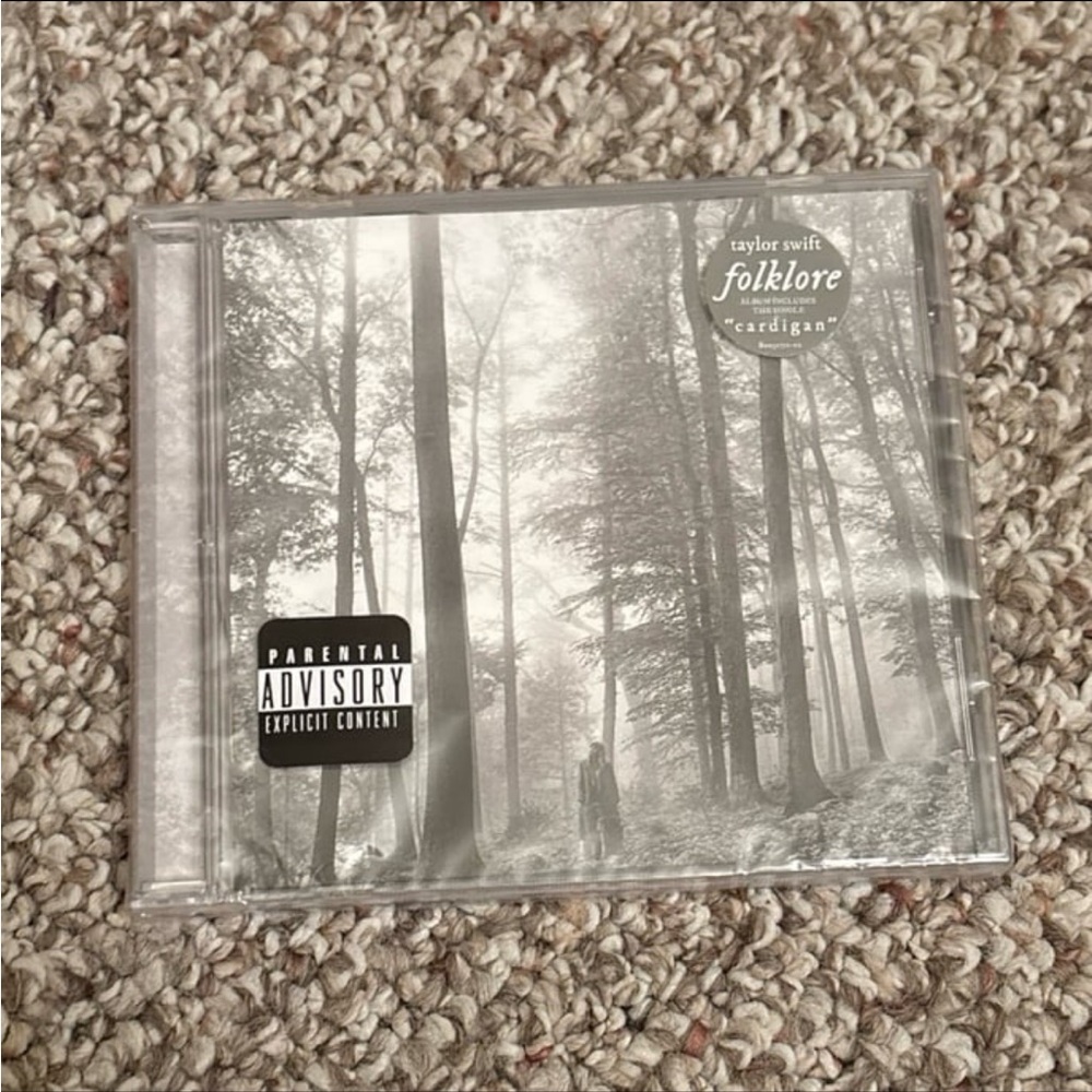 Folklore “In The Trees” (Explicit Version) CD with hype stickers
